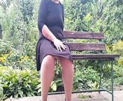 Lustful MILF pissing while sitting on a bench from hot sit
